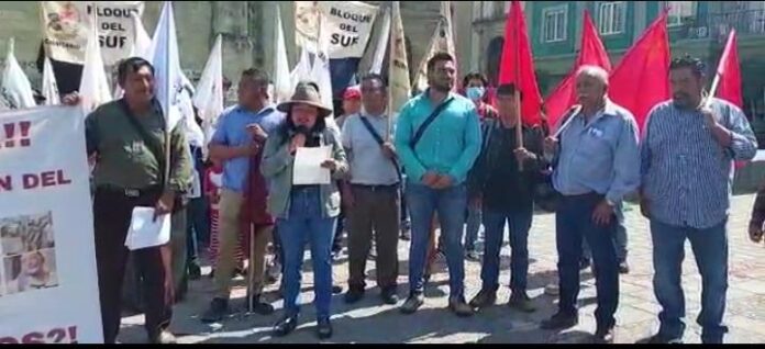 Los manifestantes exigen castigo a los autores intelectuales y materiales de la masacre ocurrida en junio de 2020 en Huazantlán del Río.